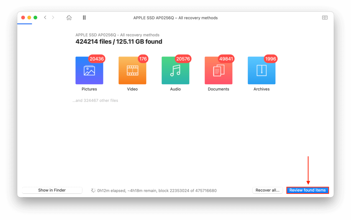 disk drill window showing file categories with a pointer towards the review found items button
