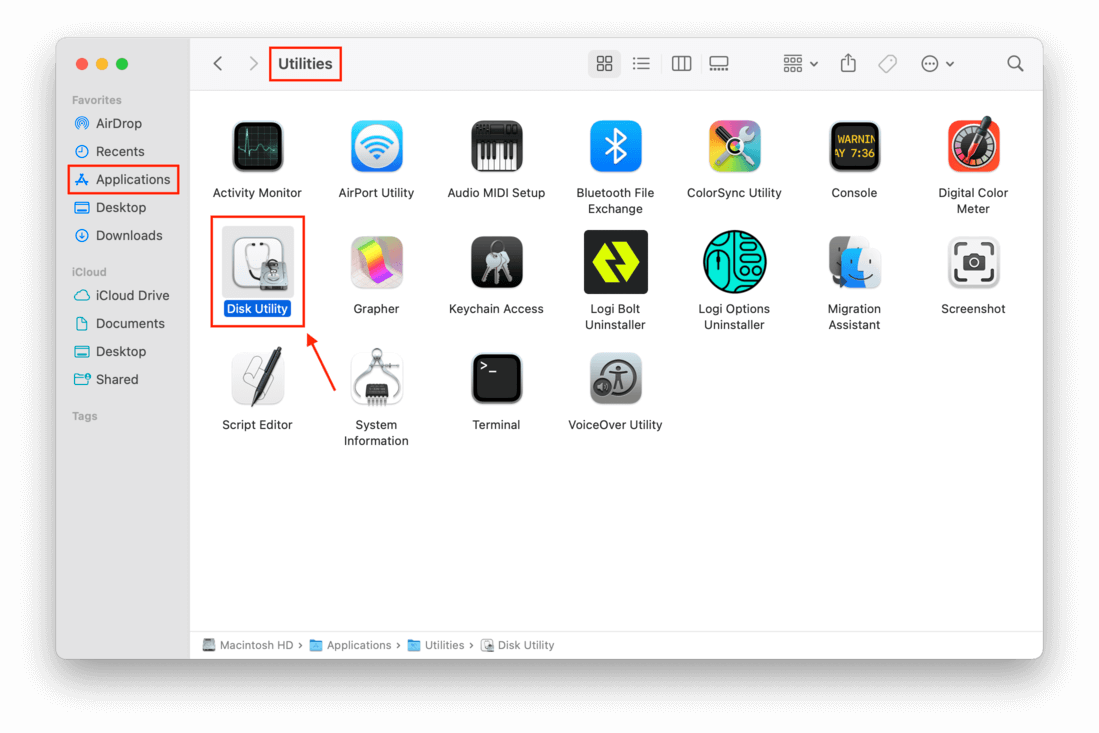 Applications window showing a pointer towards Disk Utility application icon