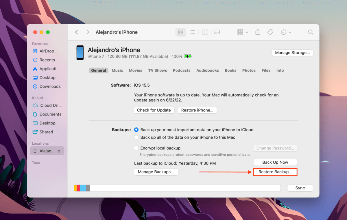 Restore Backup button in the iPhone menu in Finder