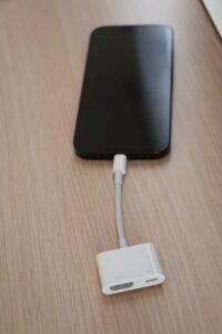 Connect Lightning-to-HDMI adapter to your iPhone